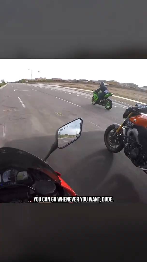 Triple-cylinder naked bike proves capable platform for single-wheel riding demonstrations