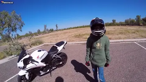 Teenager wired with microphone describes experience riding sport motorcycle