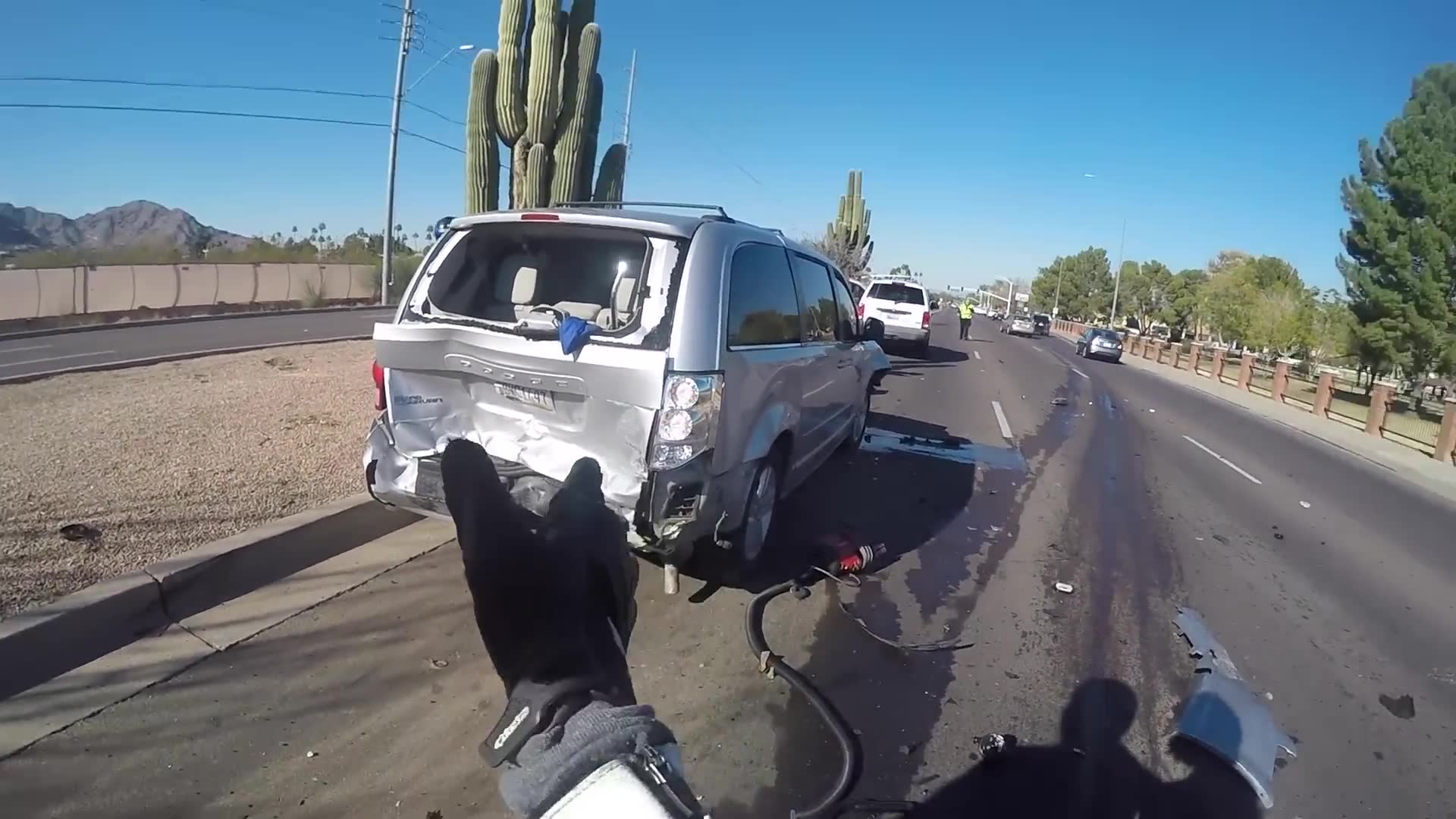 Riders come upon a fresh accident scene and pull over to help at the crash site