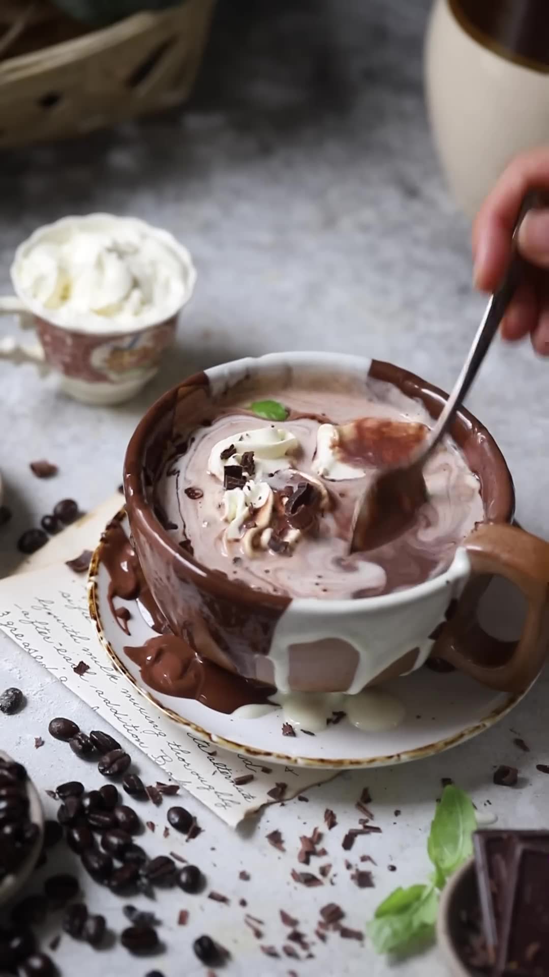 Chocolate chip cookies with hazelnut centers and drinking chocolate