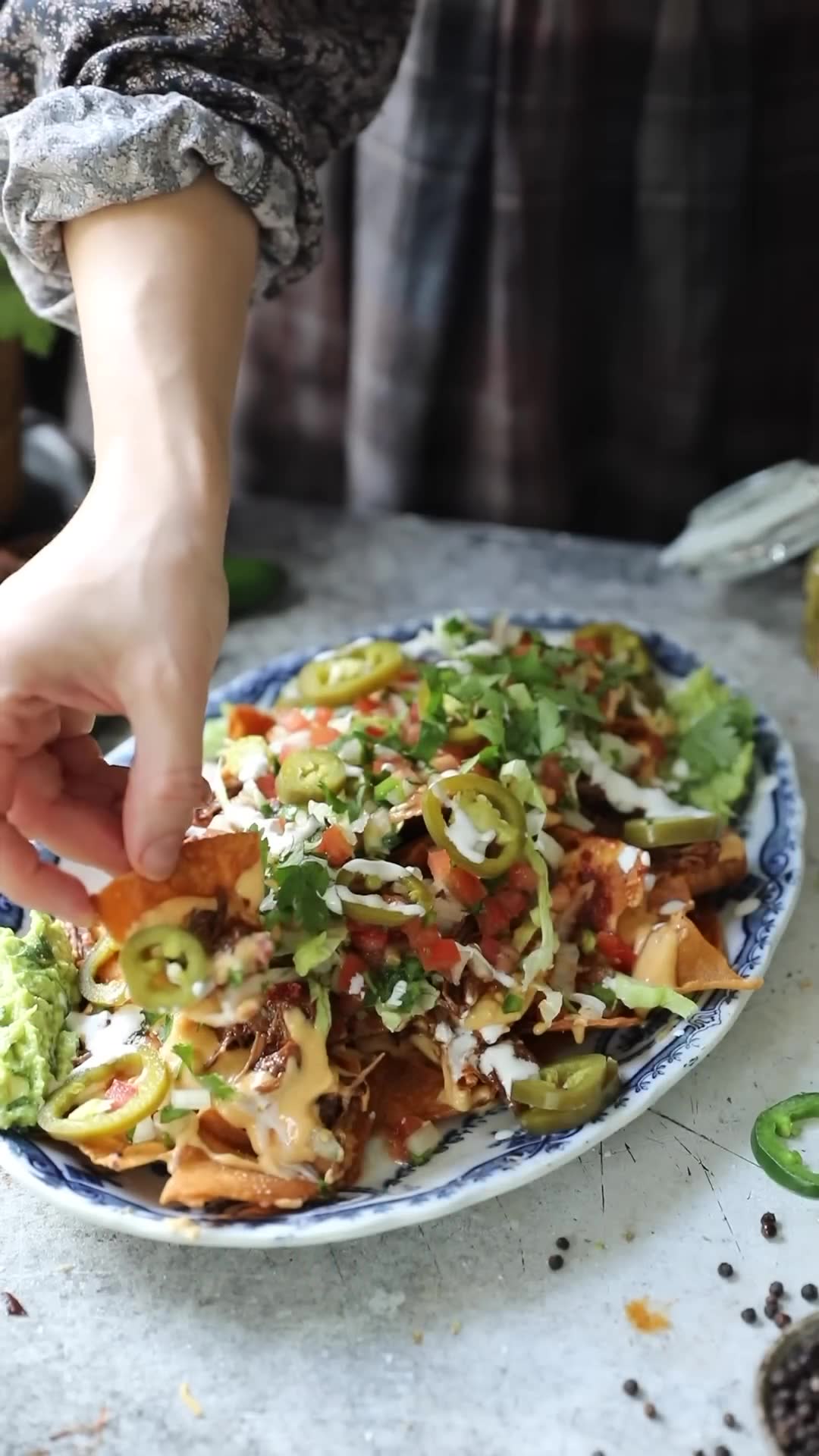 Buffalo wings, crispy potato salad, and loaded birria nachos