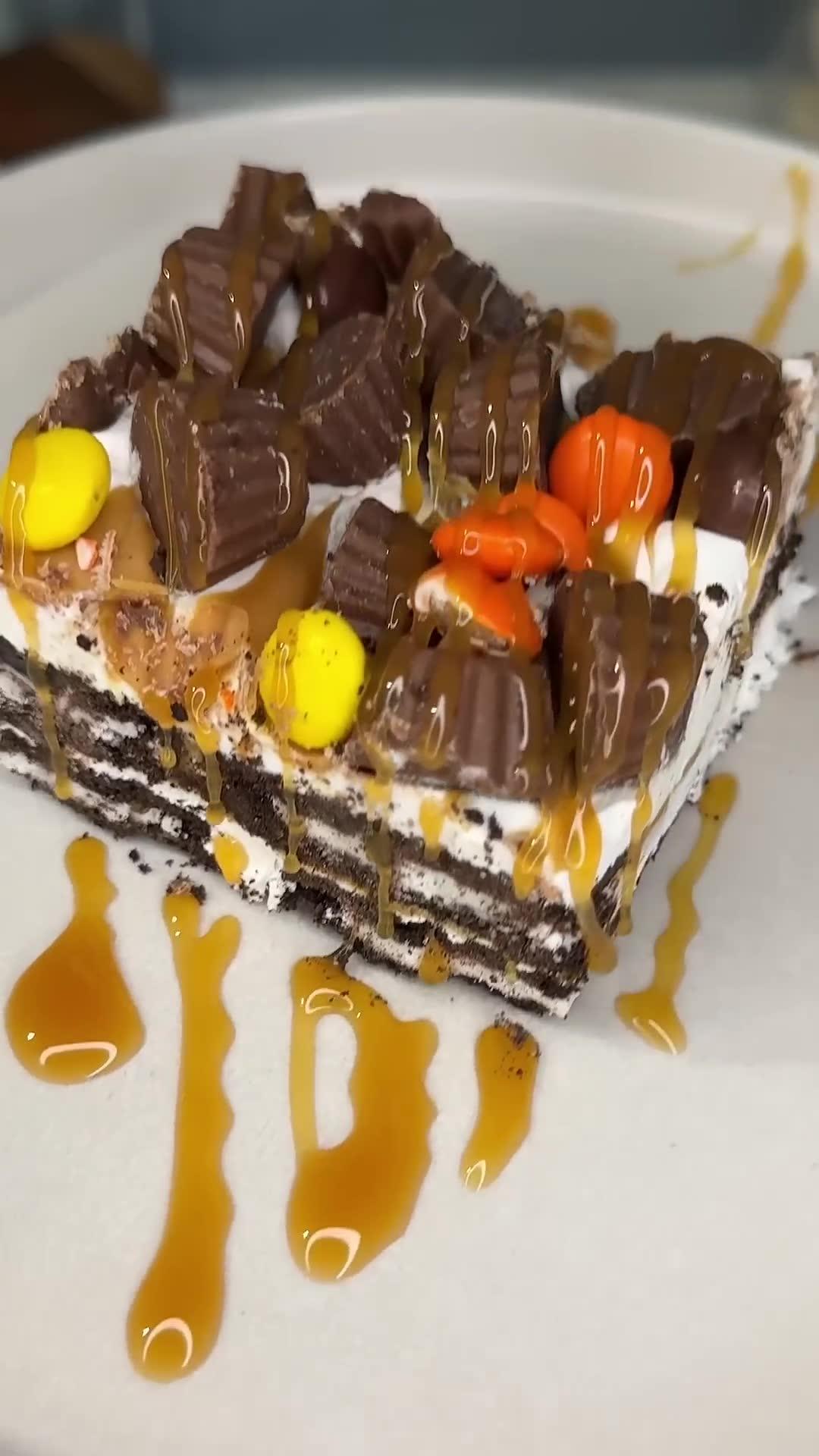 Layered no-bake dessert combines chocolate cookies with peanut butter cups