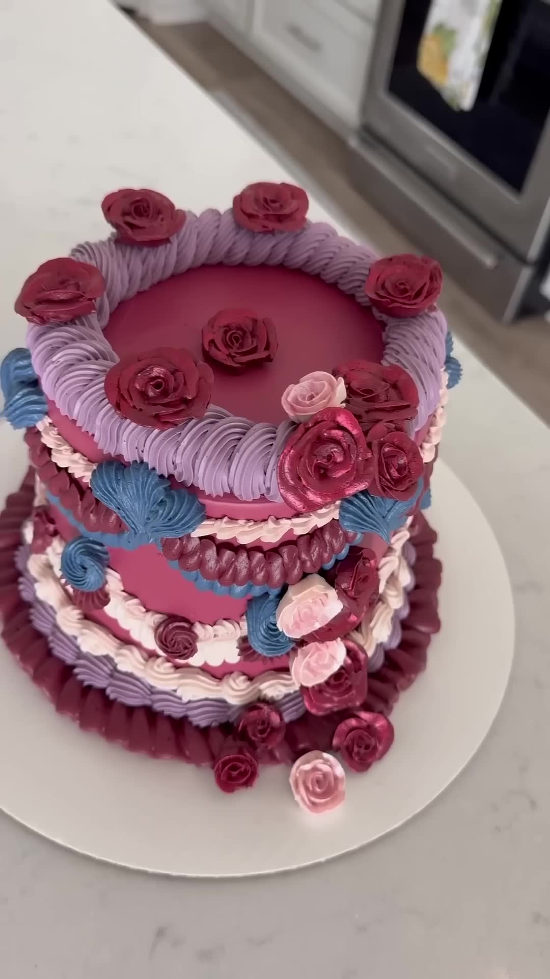 Decorating stunning cake featuring deep rich color palette